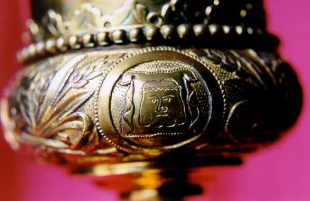Engraved medallion of Veronica's Veil on the gilt chalice base