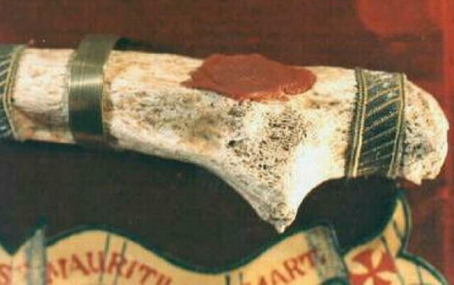 Close view of a red wax seal on the ulna relic